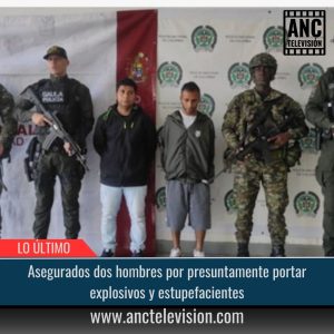 Asegurados dos hombres.